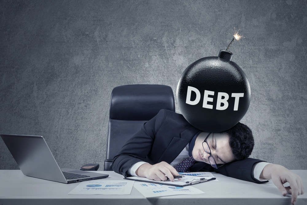 صورة توضيحية:الديون الخارجية من أسباب إنهيار الأعمال 